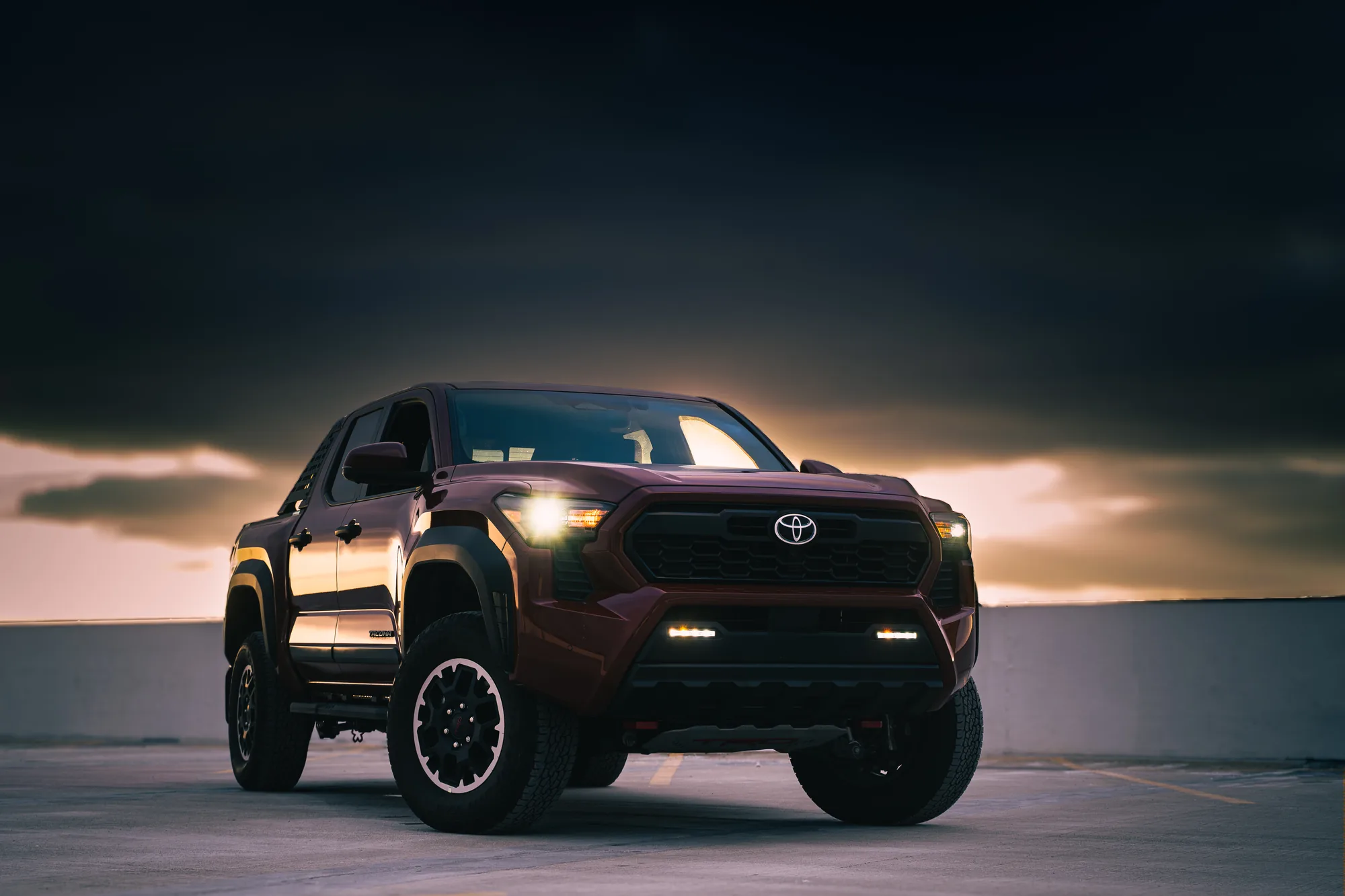 Toyota Tacoma under stormy skies